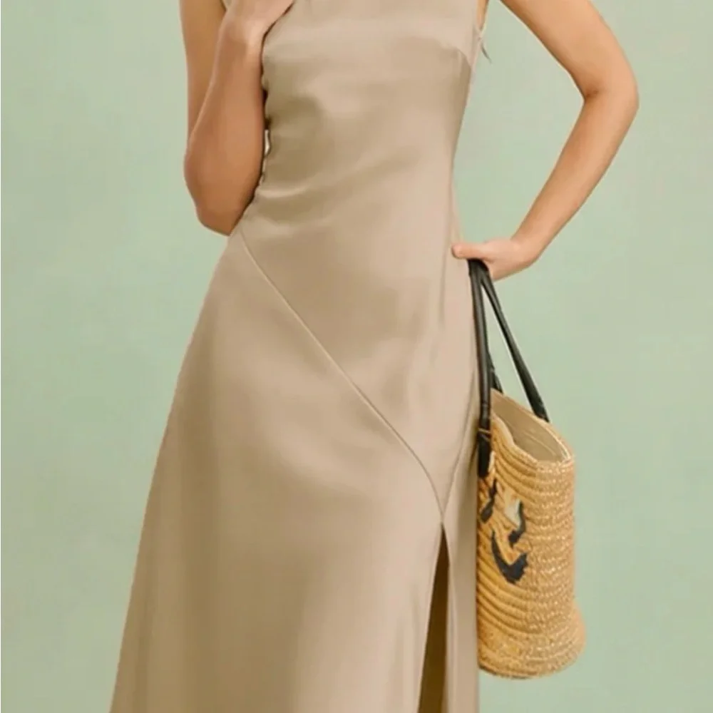 Elegant Cream Sleeveless Dress - Picture 2 of 8